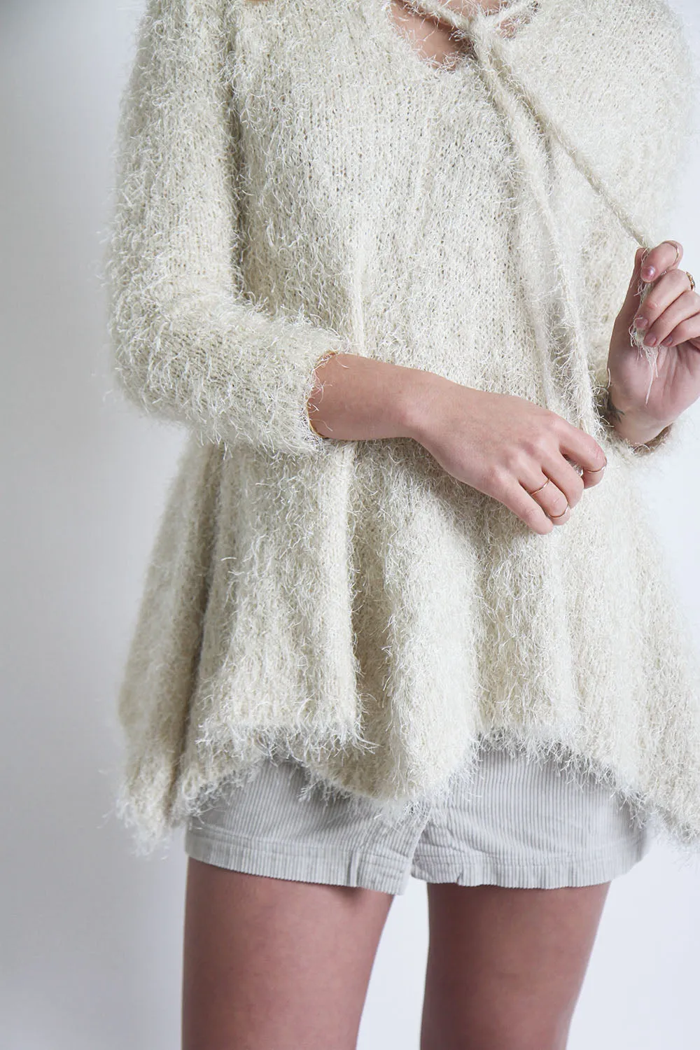 Fuzzy Vanilla Sweater with Handkerchief Hem